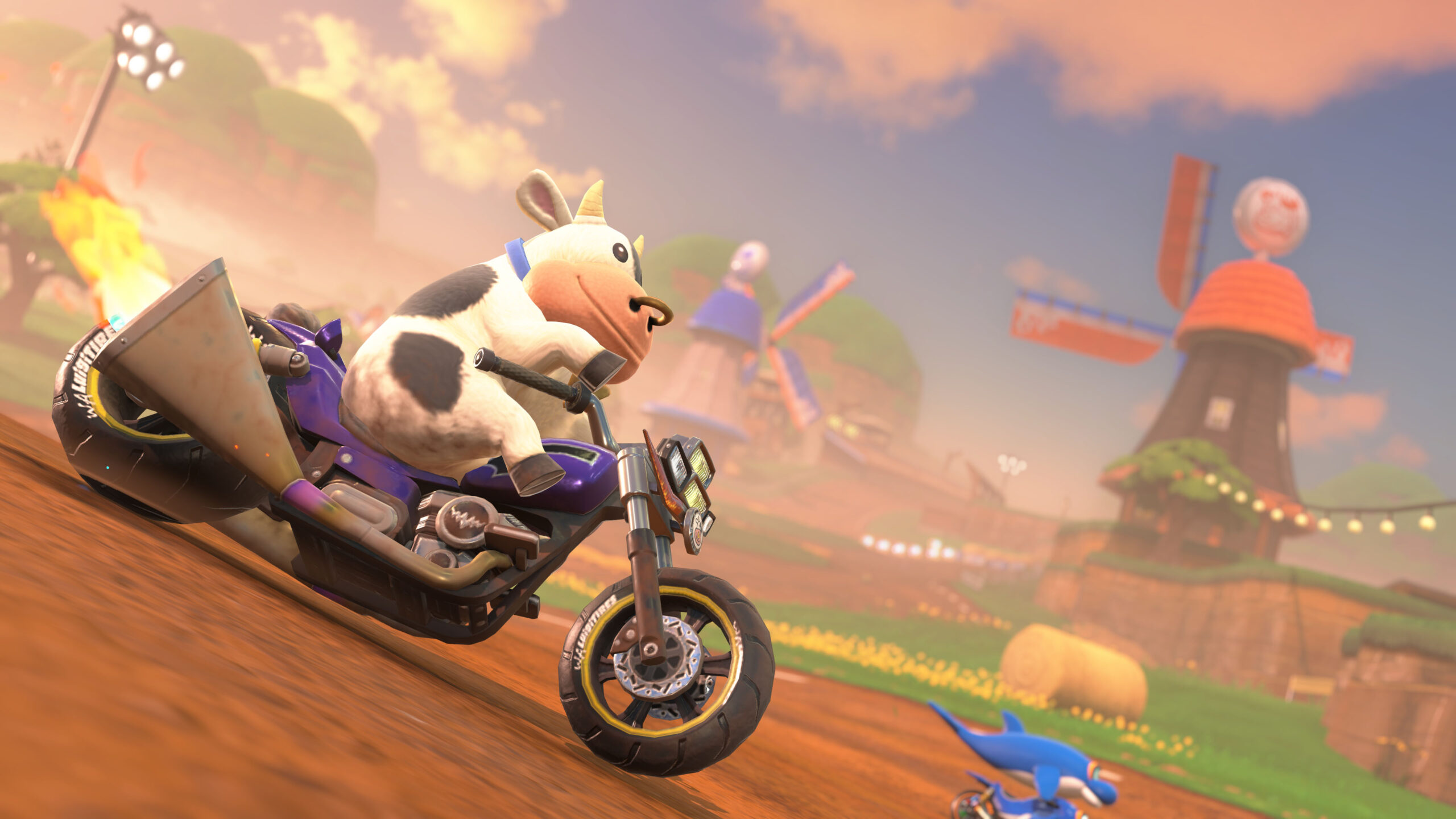 cow kjører motorsykkel i spillet mariokart world på nintendo switch 2